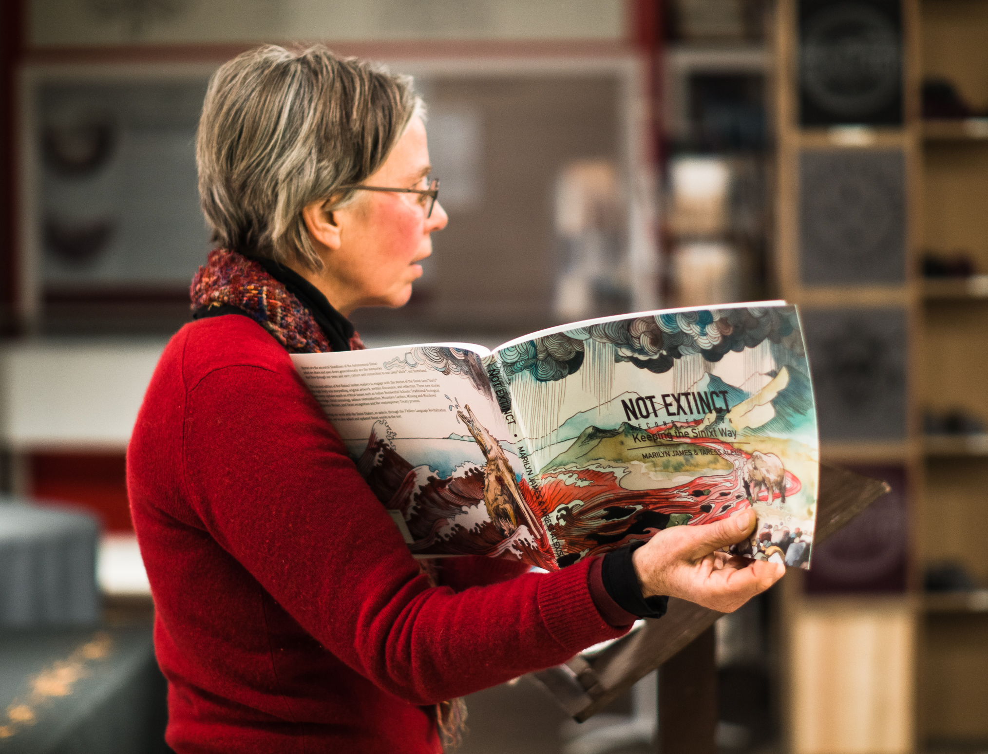 Maa Press Publisher K.L. Kivi presents the scond edition of the book Note Extinct: Keeping the Sinixt Way at the Rossland Museum and Discovery Centre on February 4, 2022. Photo by Louis Bockner.